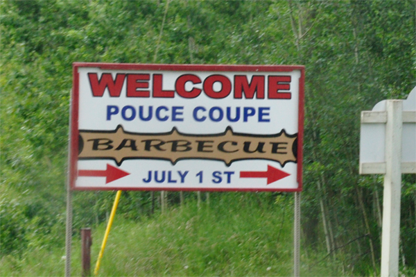 Pouce Coupe welcome sign